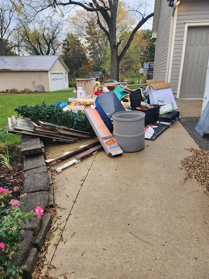 Dumpster being loaded with debris for 30 Yard Dumpster Rental in Horseheads
